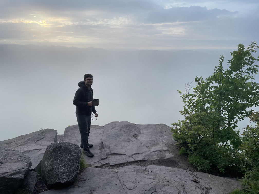 Dan having morning coffee in the clouds