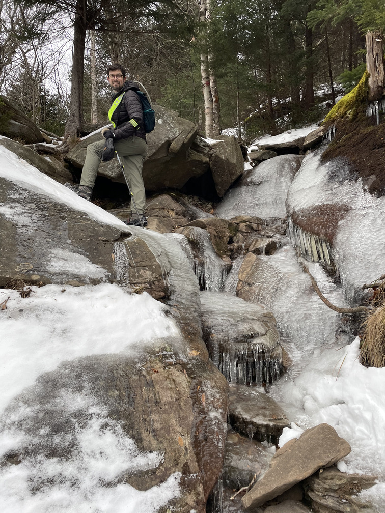 Dan atop a frozen waterfall
